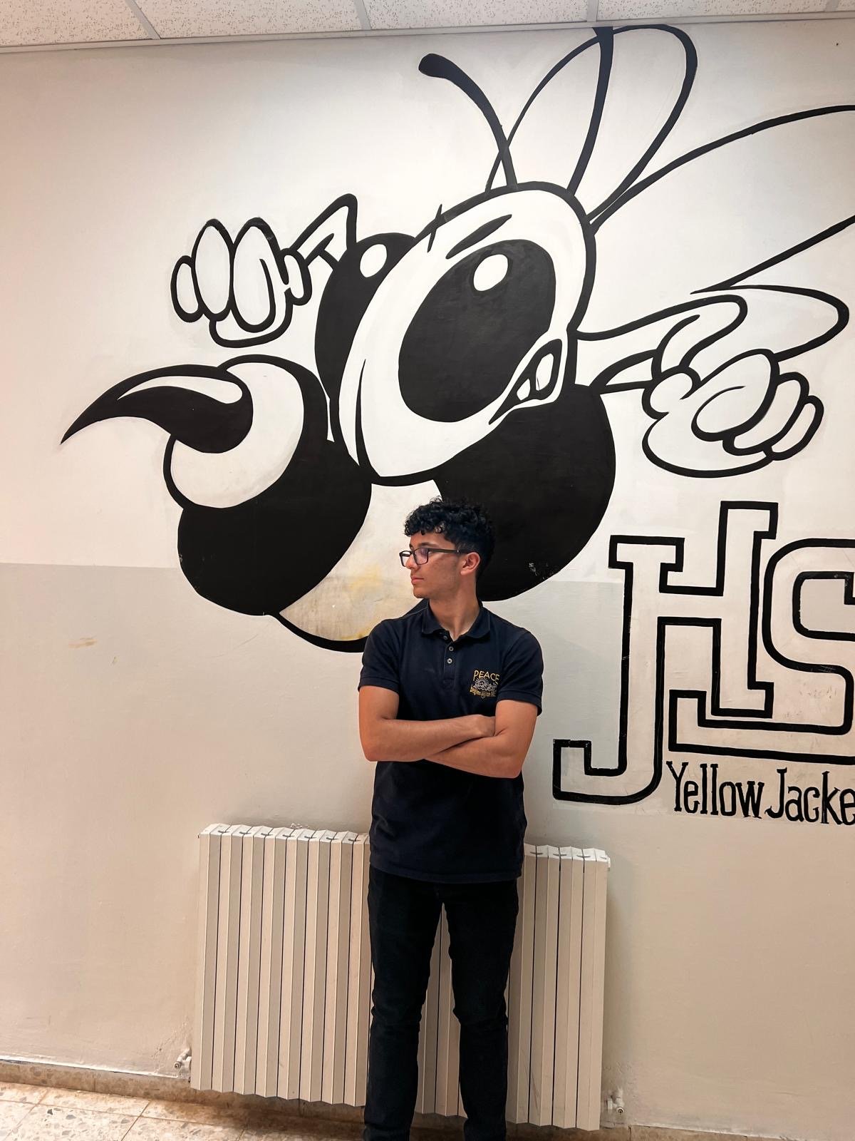 Raymond greeting students